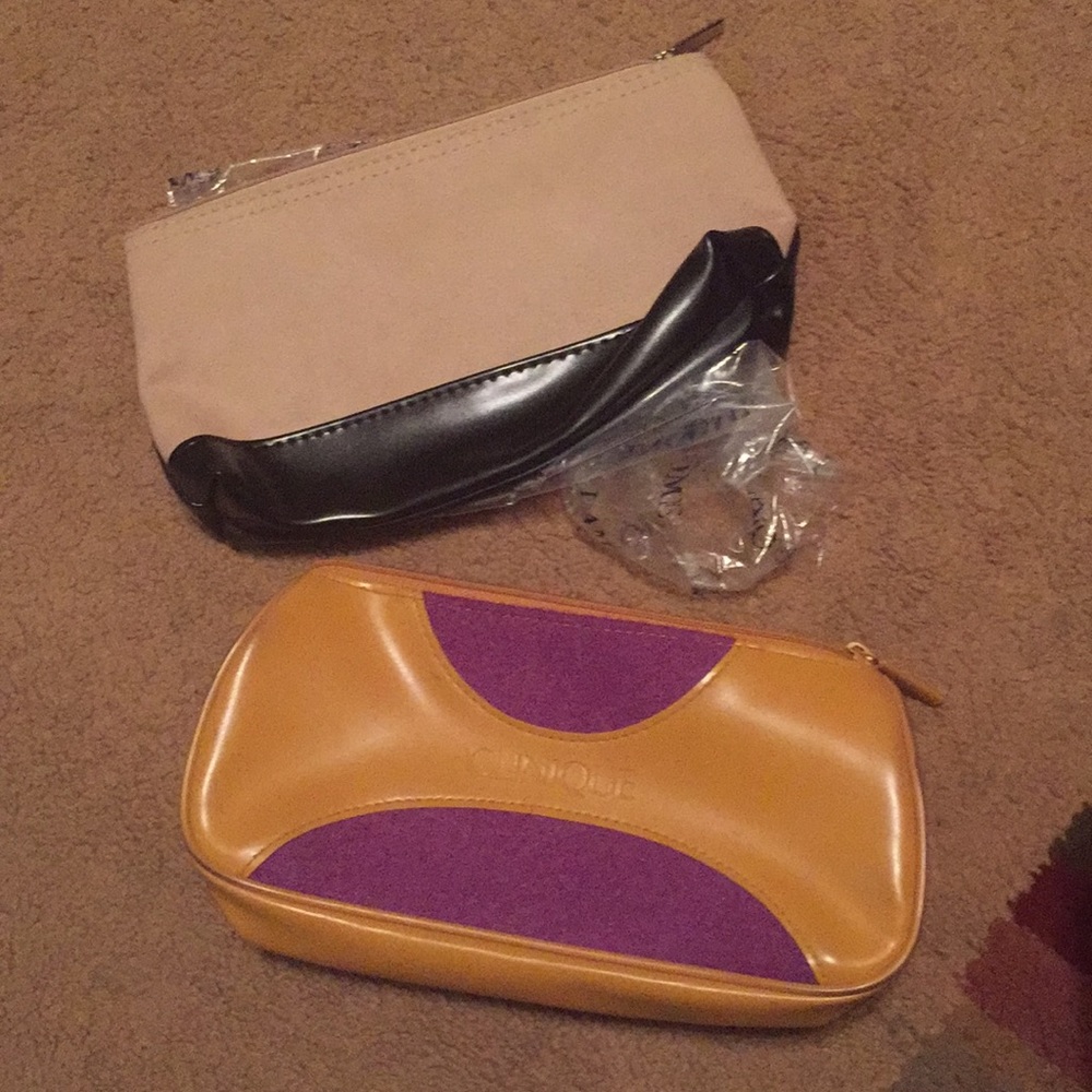 Clinique makeup bag and Lancôme bag.